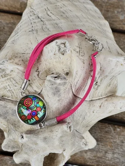 Lederarmband mit Cabochonperle Armkette Armband mit pinken Lederbändern 20mm Cabochon Glasperle mit bunten Baummotiv und Blüten
